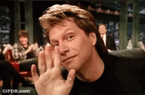 Close Up Man Face With Waving Hand GIF