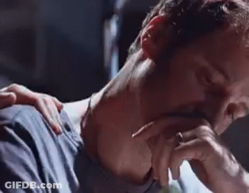 Close Up Man Face With Woman Hand GIF