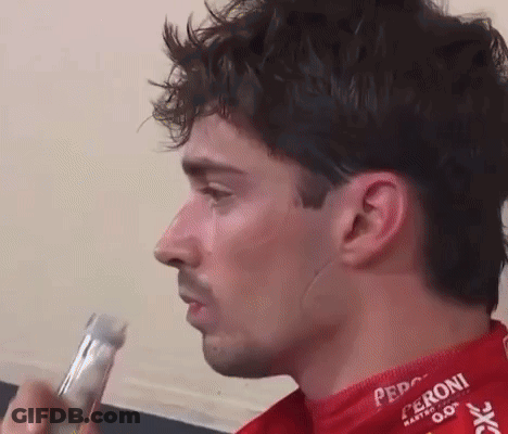 Close Up Man Holding Microphone GIF