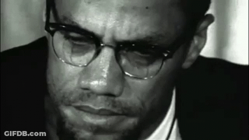 Close Up Man In Glasses And Suit Black And White GIF
