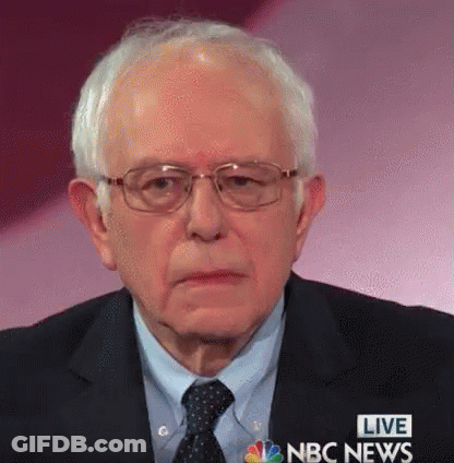 Close Up Man In Glasses And Suit With Live NBC News Text GIF