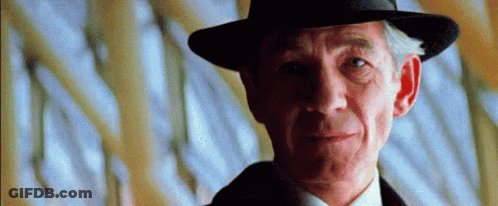 Close Up Man In Hat And Suit GIF