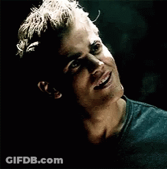 Close-Up Man Making Funny Face In Dark Room GIF