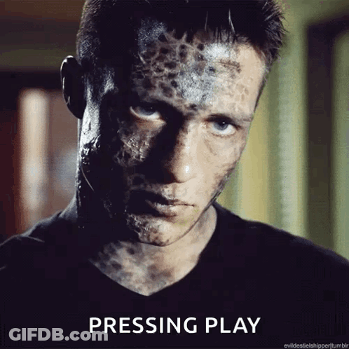 Close Up Man Pressing Play GIF