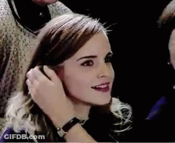 Close Up Man Putting Ring In Woman's Ear GIF