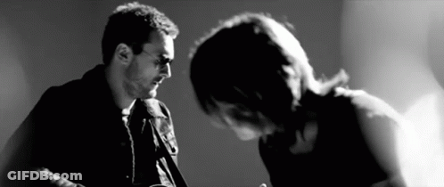 Close-Up Man's Face Black Background GIF