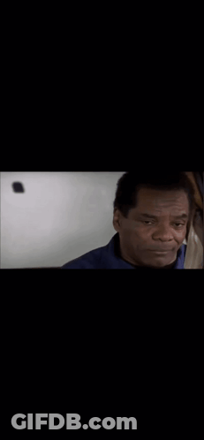 Close Up Man's Face Black Background GIF