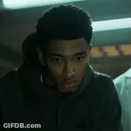 Close Up Man's Face In Dark Room GIF