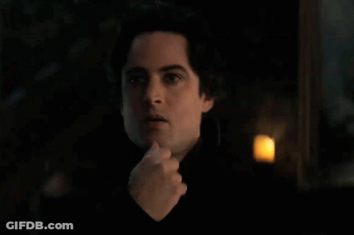 Close-Up Man's Face In Dark GIF