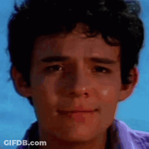 Close-Up Man's Face With Blue Sky GIF