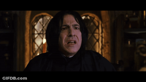 Close Up Man's Face With Dark Background GIF
