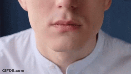 Close Up Man's Mouth White Shirt Blue Background GIF