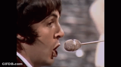Close Up Man Singing Into Microphone GIF