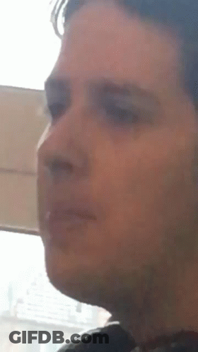Close Up Man Smirking GIF