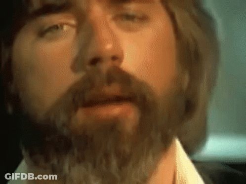 Close Up Man With Beard And Long Hair GIF