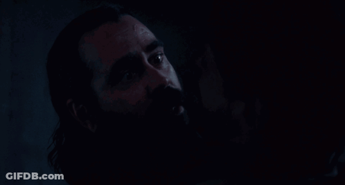 Close Up Man With Beard In The Dark GIF