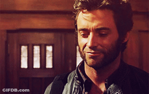 Close Up Man With Beard Looking Down GIF