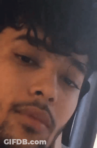 Close Up Man With Beard Making Face GIF