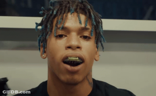 Close Up Man With Blue Dreadlocks GIF