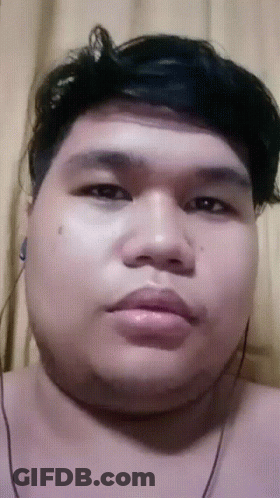 Close Up Man With Ear Buds GIF