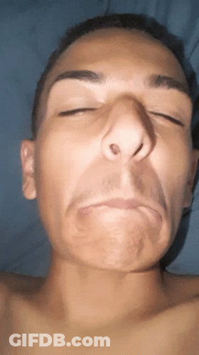Close Up Man With Eyes Closed And Hole In Nose GIF