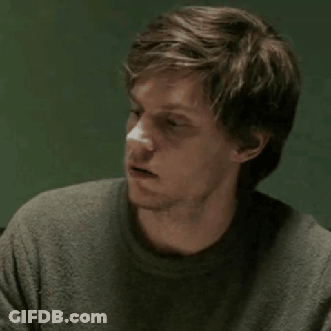 Close Up Man With Eyes Closed Green Background GIF