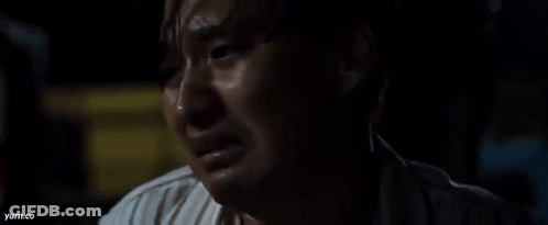 Close Up Man With Eyes Closed In Dark Room GIF