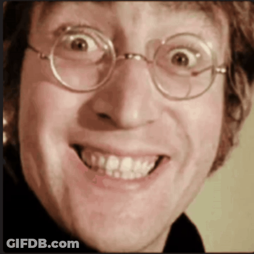 Close-Up Man With Glasses Smiling GIF