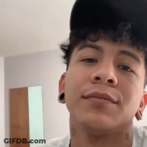 Close Up Man With Hat And Neck Tattoo GIF