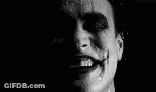 Close Up Man With Joker Smile Black And White GIF