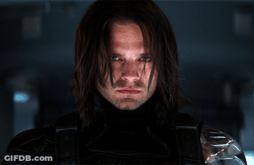 Close Up Man With Long Hair And Blue Eyes GIF