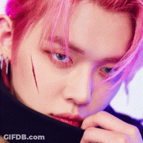 Close Up Man With Pink Hair And Scar GIF