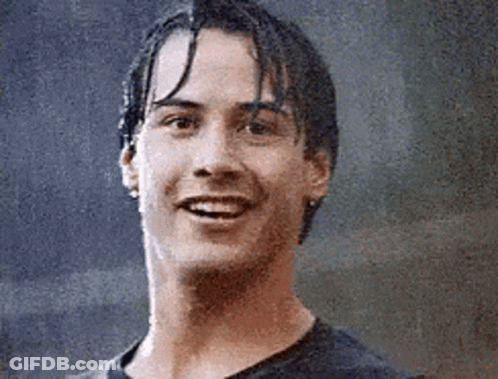 Close Up Man With Wet Hair Smiling In Rain GIF