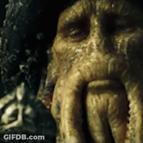 Close Up Monster Face With Huge Mouth GIF