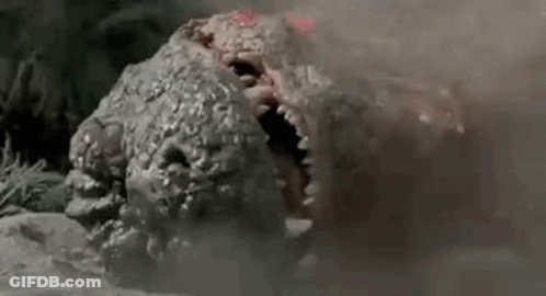 Close Up Monster Head With Open Mouth And Teeth GIF