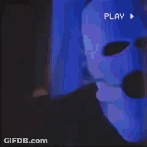 Close Up Mouth With Fangs Saying Play GIF