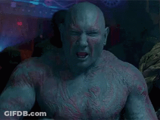 Close Up Muscular Bald Man With Beard GIF