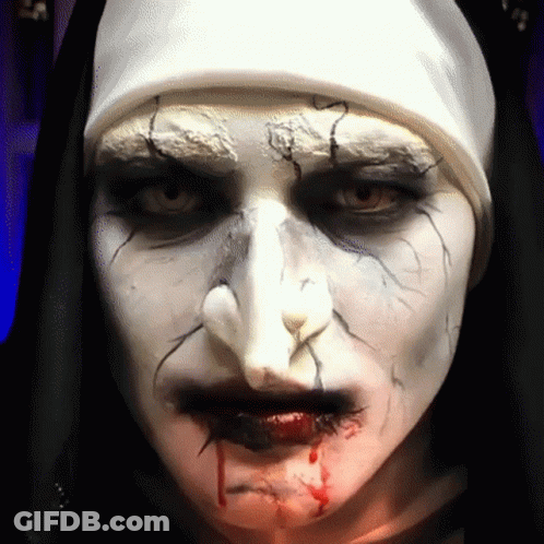 Close Up Nun Face With Blood GIF