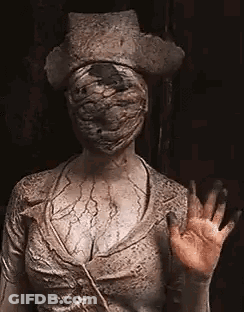 Close Up Nurse Statue Waving GIF