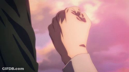 Close Up Of A Fist Against Pink Background GIF
