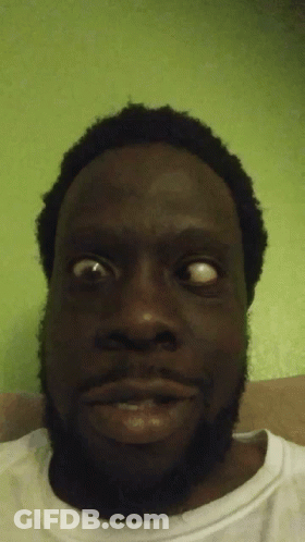Close Up Of A Man's Face On Green Background GIF
