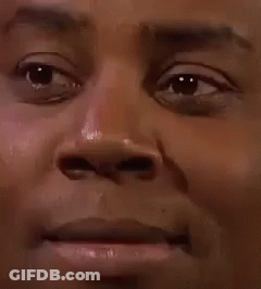 Close Up Of A Man With A Slight Smirk GIF