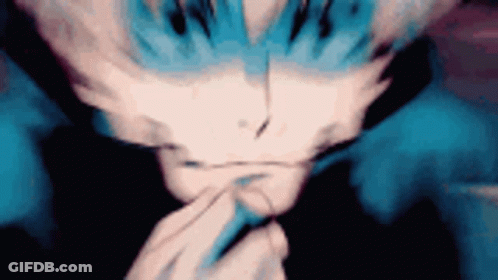 Close Up Of A Person's Face With Blurry Background GIF