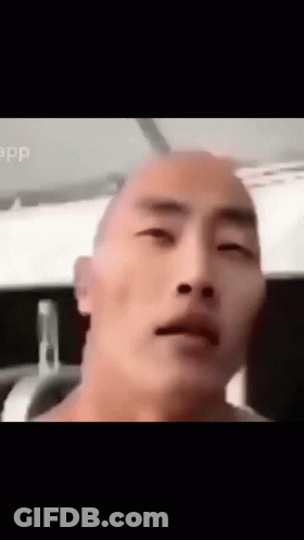 Close Up Of Bald Man's Face GIF