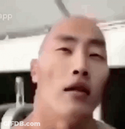 Close Up Of Bald Man's Face GIF