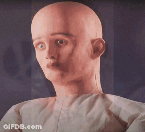 Close Up Of Bald Man's Face GIF
