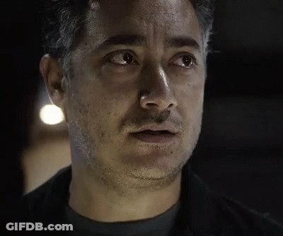 Close Up Of Bearded Man In Black Jacket GIF