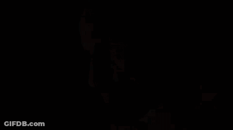 Close Up Of Bearded Man In Dark GIF