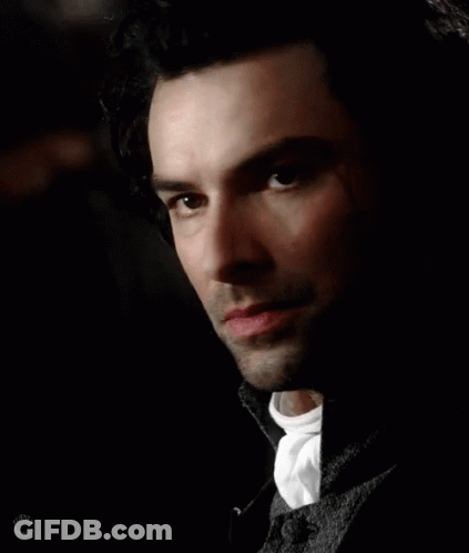 Close Up Of Bearded Man's Face In Darkness GIF