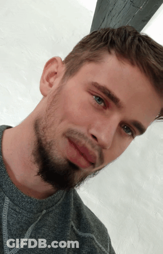 Close Up Of Bearded Man With Blue Eyes GIF